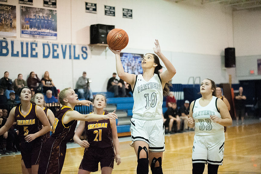 12-13 tv Kaylea Baisden hits layup after a nice pro hop move .jpg